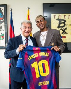 Lamine Yamal junto al presidente del FC Barcelona